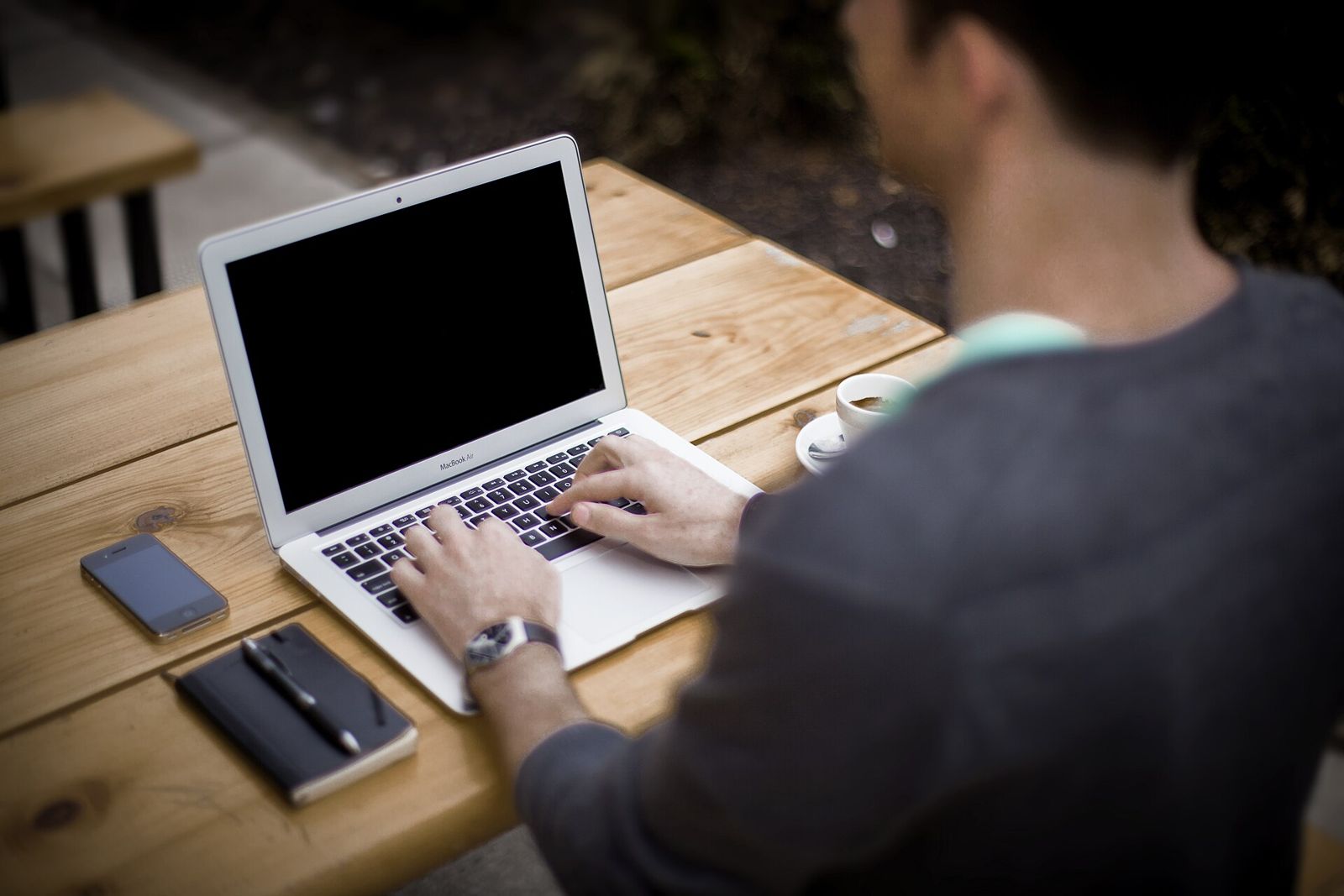 Working on a laptop outdoors